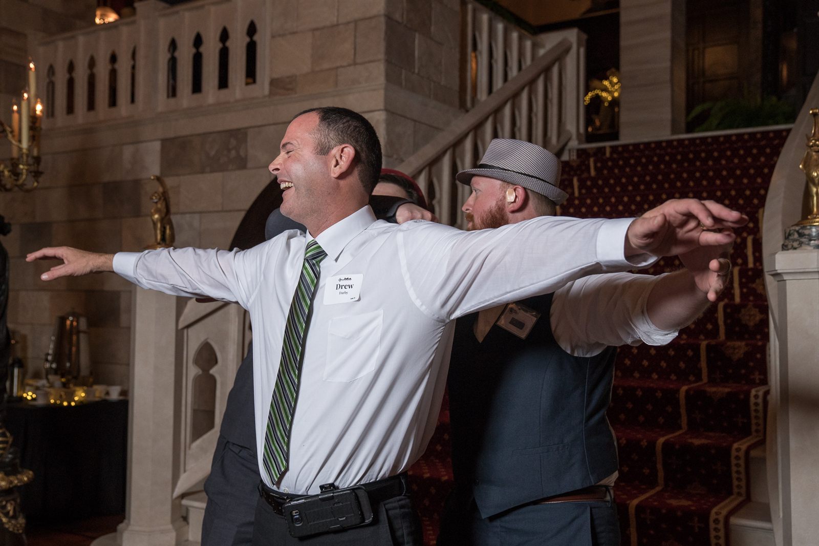Actors performing a Murder Mystery Company dinner show