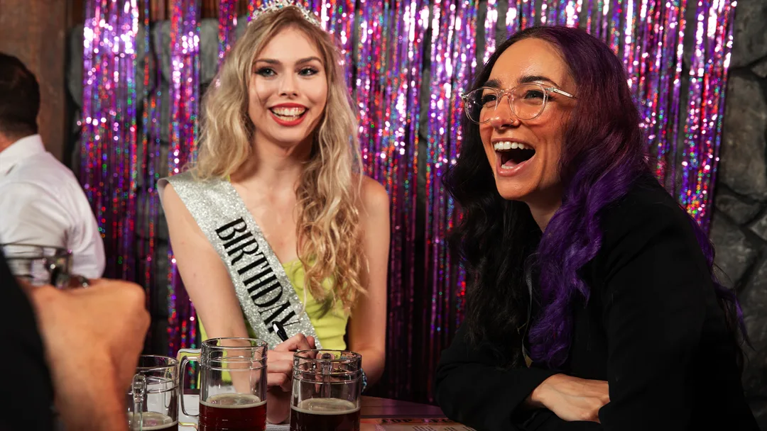 Guests celebrating at a Baltimore murder mystery party