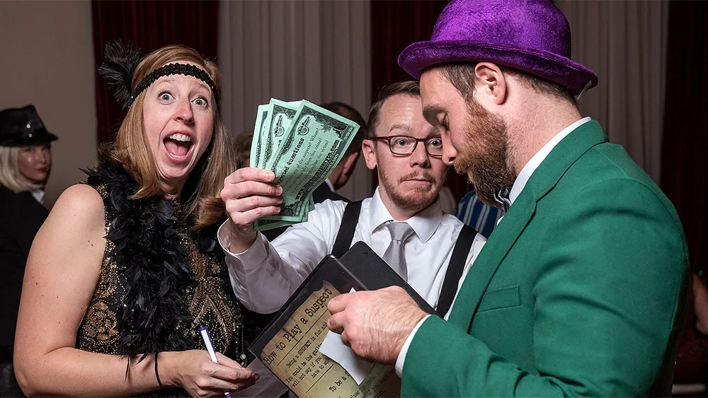 Guests enjoying a Baltimore murder mystery party
